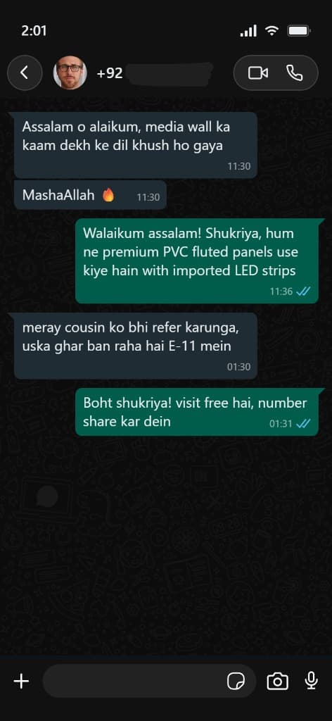 WhatsApp chat screenshot for living room media wall and E-11 referral